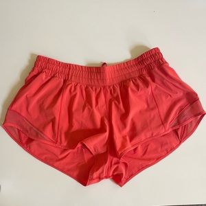 Lululemon Hotty Hot 2.5 inch shorts. Coral color. Size 10.
